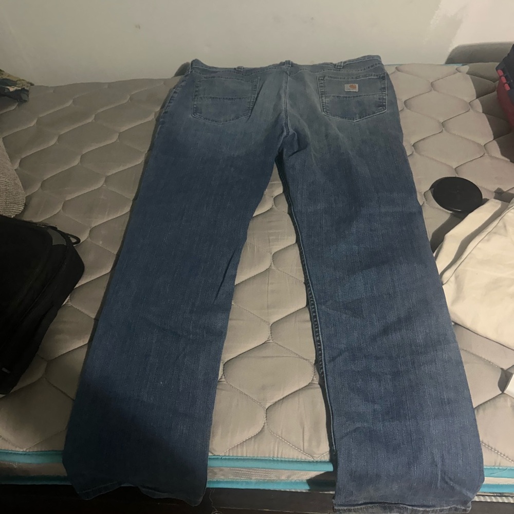 Carhartt Men's Relaxed Fit Blue Jeans paint stain on leg
